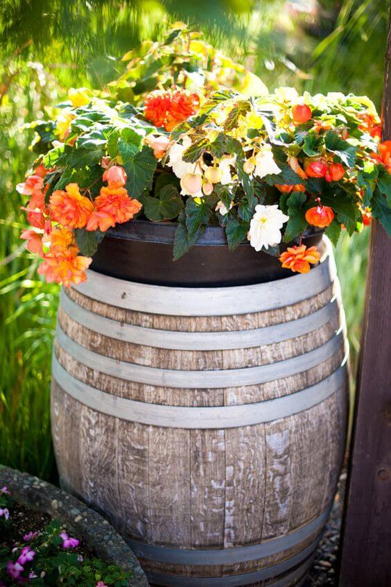 24 repurposed old wine barrel ideas for the garden - 175