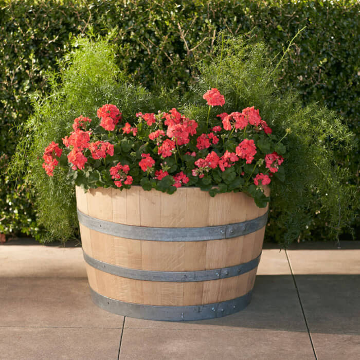 24 repurposed old wine barrel ideas for the garden - 197